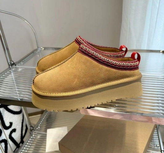 Thassy light brown slippers.